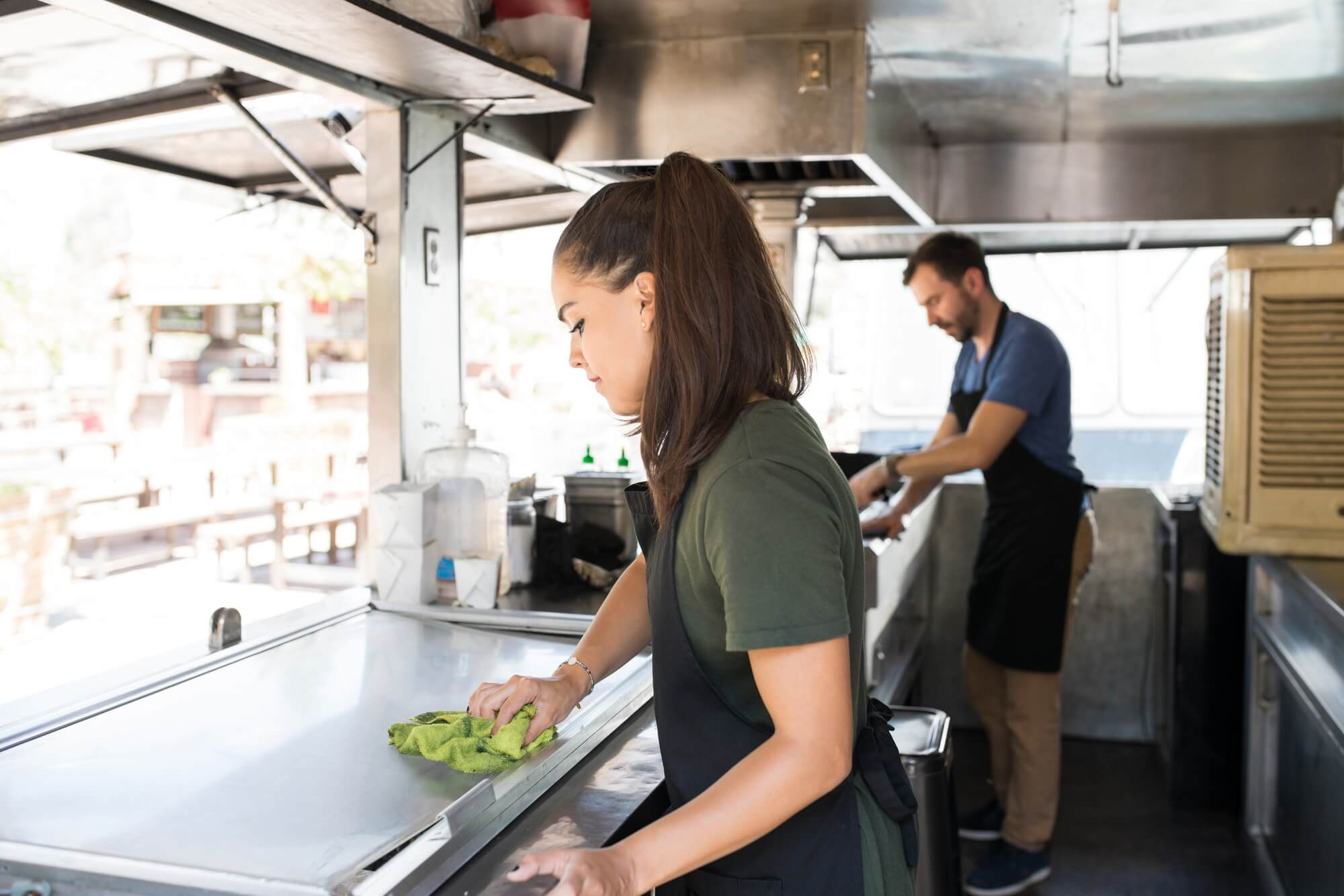 Young woman cooking fresh organic food